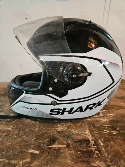 I'm selling a used Shark Vision-R helmet, known for its high technology multi-axial fibre structure...