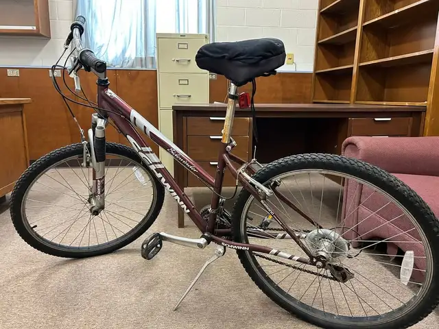 Bicycle with Helmet in Road in Fredericton - Image 2