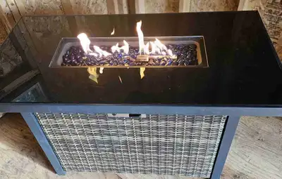 Black Glass Top Fire Table with cover. Purchased for 550.00 2 years ago Excellent condition, only us...