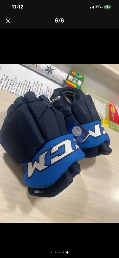 Winnipeg jets Game used Neil Pionk gloves , View more