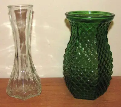 In perfect condition, from the 1970s. The clear vase is 6" high, & the green vase is 5 & 7/16" high....