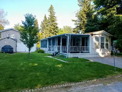 You own a share of the whole resort. Park Model is 12'x43', New 30 year shingles, Partial lake view,...