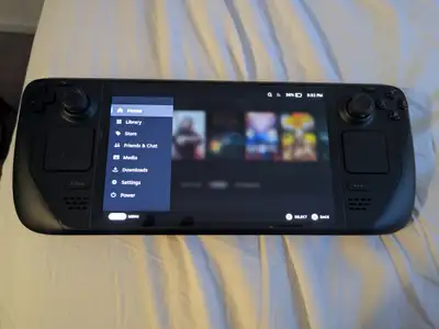 Steam deck OLED 512 with carrying case and charger, View more