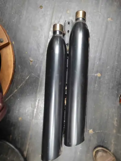 Exhaust tips from 2012 Victoria Hammer 8-Balll. Will other model years and makes for Victory.