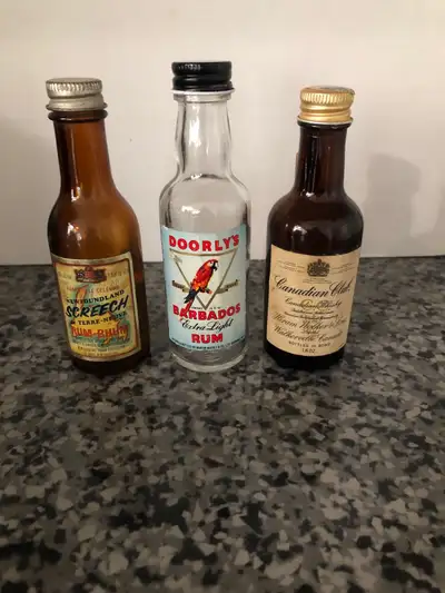 3 little collectable empty bottles. $4 for all 3