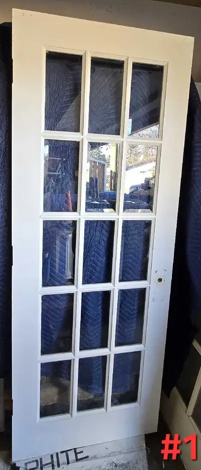 #1 - Solid wood interior with beveled glass inserts, painted white. No hardware, originally left han...