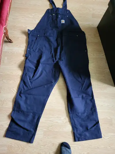 2 pair Carhartts sizes 48x32 and 52x32 all new $75 a pair