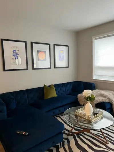 Stunning, large, dark blue velvet sectional couch. 3 pieces, dimensions in photo. Selling in order t...