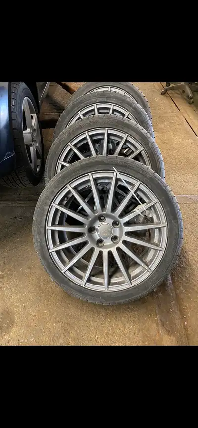 235/40/18 - 5x112 (112mm) 5 lug Rims 5 Tires, extra rim and tire included. 1 year old tires. New car...