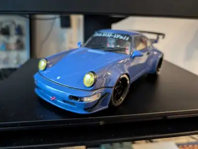 Solido 1:18 Porsche 911 (964) RWB (only front doors open). Like new condition, just some dust, displ...