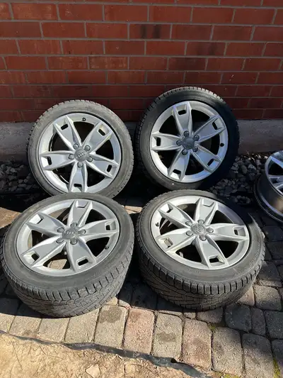 Selling a Set of OEM 17” Audi Rims On Continental Winter tires. 3 tires have decent tread left, othe...