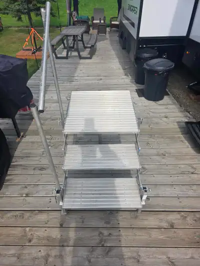 Folding aluminum RV steps, comes with detachable handrail $50.00