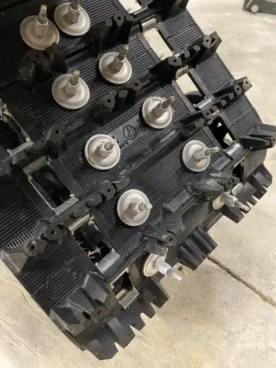 850 etec engine with 2228 miles, 1.5 inch track studded, ice scratchers on skis, pilot x skis with 6...