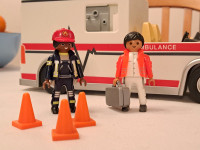 Playmobil ambulance, 2  figures + accessories. 