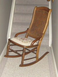 ANTIQUE CANED ROCKING CHAIR (LOCATION IS PORT DOVER, ON)