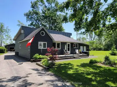 Charming ,move in ready 4 season home sits on a large private lot steps from Lake Simcoe. Open conce...