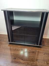 Tv table with glass doors