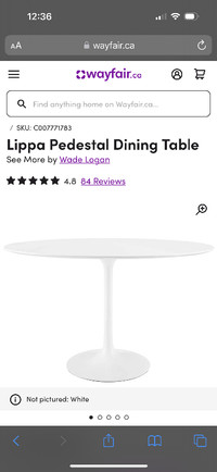Oval pedestal dining table