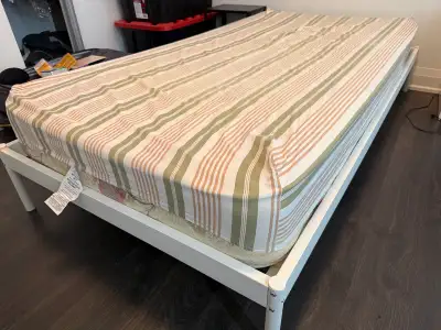 This pre-loved IKEA bed frame and mattress set offers a clean and simple sleeping solution for your...
