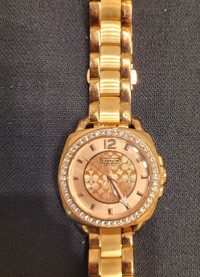 Woman's COACH Rose Gold watch