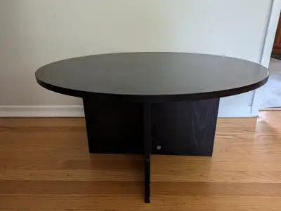 Round Modern Coffee Table. Black color and great condition., View more