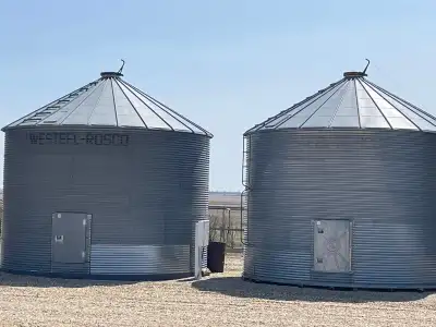 I have two 3300 bu westeel bins with Keho aeration ducts and aftermarket lid openers. One is on a st...