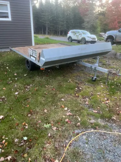 2013 black hawk 8’ x 10’ tilt snowmobile trailer. $1650 obo could use new deck in future. Call or tx...