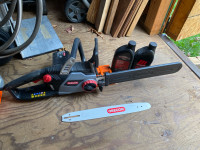 Chainsaw, sharpener, and extras