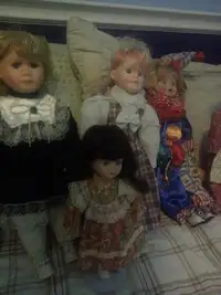 Beautiful Porcelain Dolls Larger ones and smaller ones.