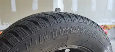 Get ready for winter with this Uniroyal Tiger Paw Ice & Snow tire, designed to provide reliable trac...