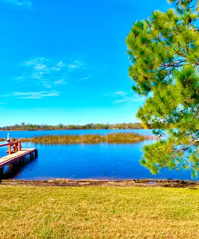 This PRIVATE WATERFRONT home is one of a kind, located in Haines City, Florida, on Lake Henry, fully...