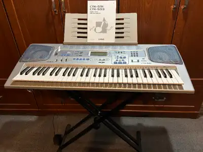 Number of Key 61; Includes Stand Battery Powered Option, Built-in Effects, Speaker Gently used, rare...