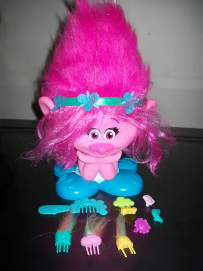 This set is complete with all the original hair clips and combs. London, Westmount