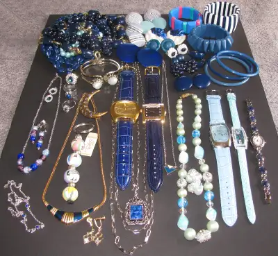 This is a beautiful mix of fashion accessories in just about every shade of blue imaginable. They we...