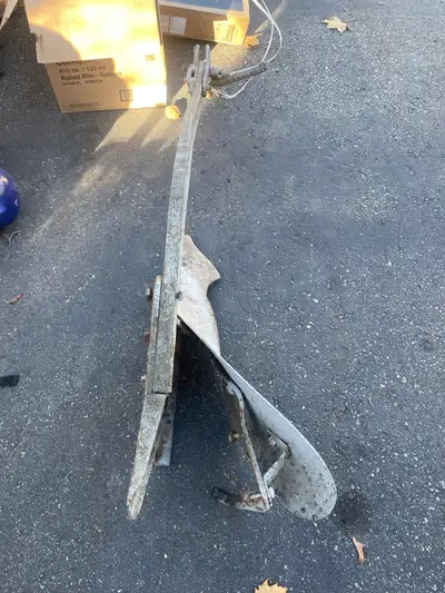 Offering a used plow, perfect for small-scale farming or garden tilling. The plow shows signs of wea...