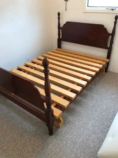 Solid Mahogany bed and dresser. Comes with futon mattress, chair, View more
