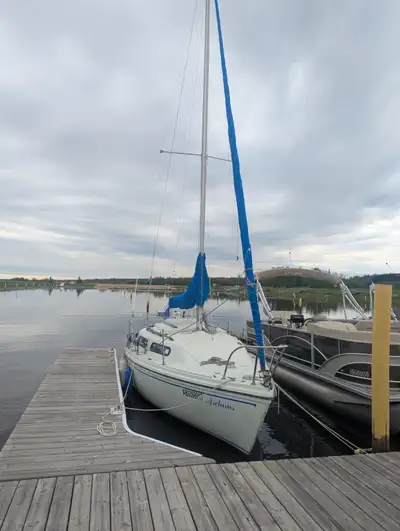 The Sirius 21 is a popular, Canadian-built trailerable sailboat. Known for its wide beam, positive f...