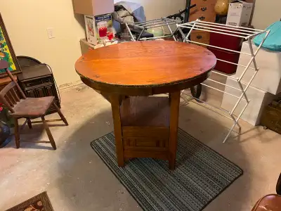 Kitchen high table, perfect for breakfast seating. Dimensions are 36" high, and 42" wide. The top co...