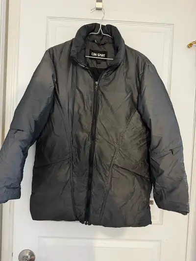 This is a CDN Spirit black winter coat in size small, perfect for those chilly days! It's got a clas...