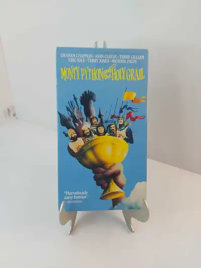 Relive the comedic brilliance with this used Monty Python and the Holy Grail VHS tape, perfect for c...