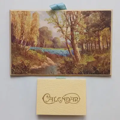 This vintage 1935 scenic nature calendar is a stunning piece of art that captures the beauty of tree...