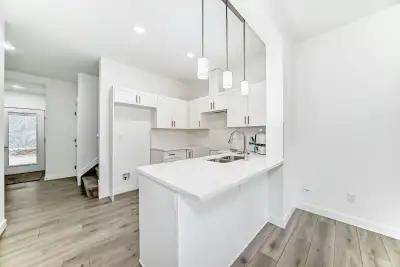Welcome to Your Brand-New 3-Bedroom Townhome end unit in Southeast Edmonton! Discover the perfect bl...