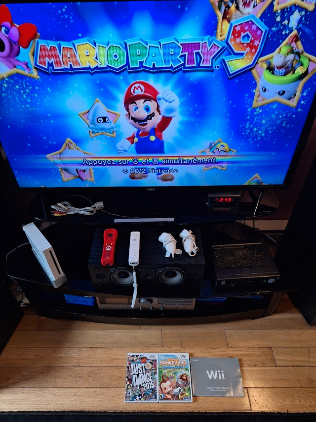 Nintendo console wii avec plusieurs jeux d intégré dedans | Nintendo Wii |  Laval/Rive Nord | Kijiji