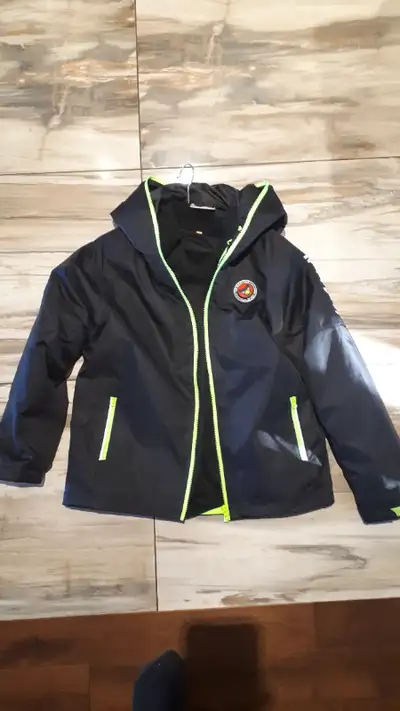 Black Angry birds jacket. Hardly used, like new. Inner liner can be unzipped to make it a spring /fa...