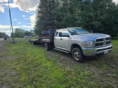 2011 Diesel crewcab. 3500 with dump box flat deck combo with gooseneck 30 k hitch. Felling tri axle...