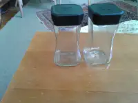 Dozen glass storage jars. 8 ounce.