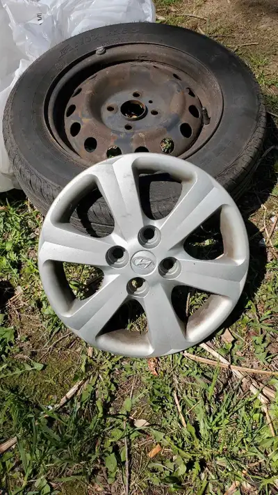 Set of 4 summer tires on rims. Four Hyundai wheel covers, too.