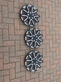 3- 15” hubcaps for car. 