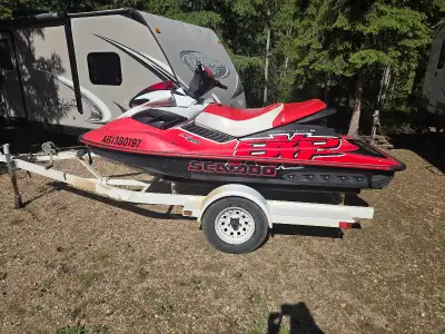 2007 seadoo rxp. 215 horse power super charged. Comes with double trailer. Needs some fiberglass wor...