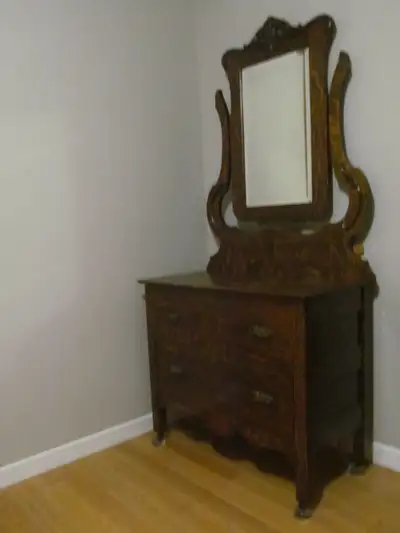 Antique unique 2 drawer dresser, solid wood with wood wheel casters in great condition. 29" high x 3...